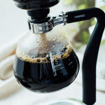 Hario Coffee Syphon Next brewing 5 cups of aromatic coffee in a heat-resistant glass chamber.