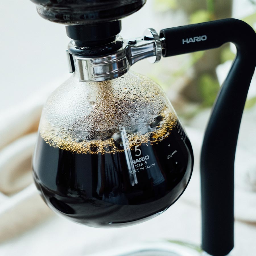 Hario Coffee Syphon Next brewing 5 cups of aromatic coffee in a heat-resistant glass chamber.