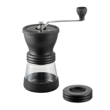 Hario Keramikkaffeemühle Skerton N with ceramic grinder and glass container.