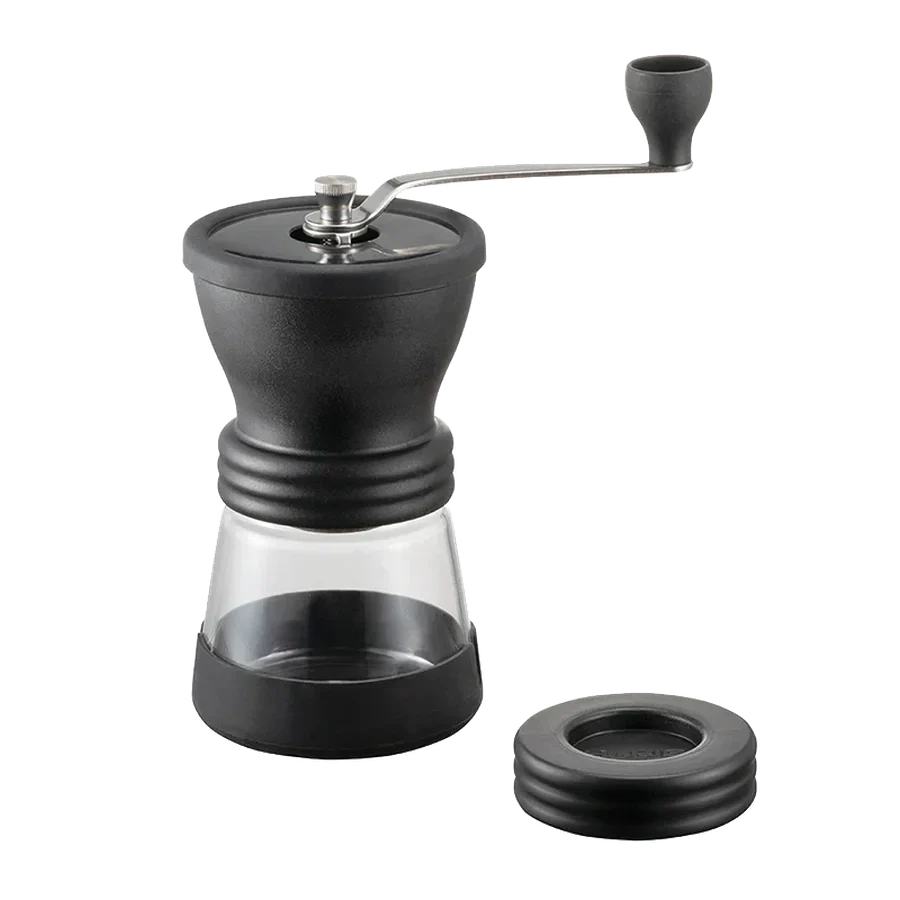 Hario Keramikkaffeemühle Skerton N with ceramic grinder and glass container.