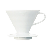 Hario V60 Coffee Dripper 02 in white ceramic with conical shape and spiral grooves.